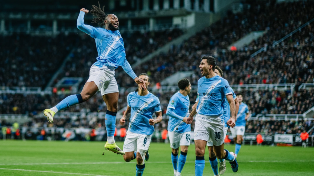 Antoine Semenyo celebrates a goal with his Manchester City team mates