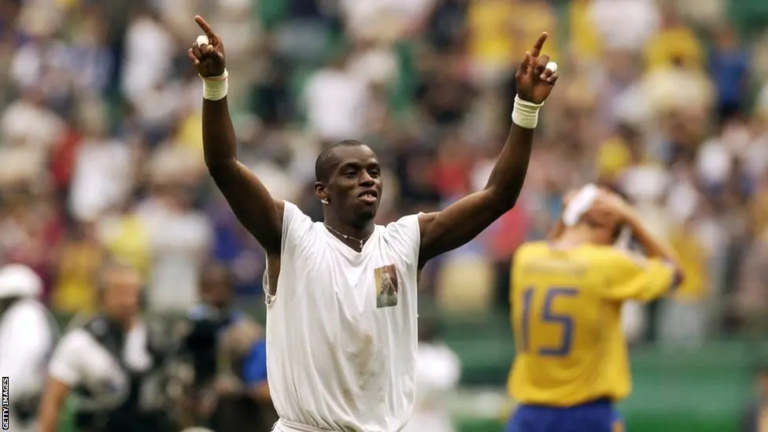 Henri Camara celebrates his Golden Goal against Sweden at the 2002 World Cup